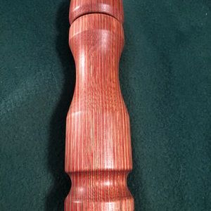 Red Black Peppermill -laminate wood.10 inches tall . Hand made on a wood lathe.